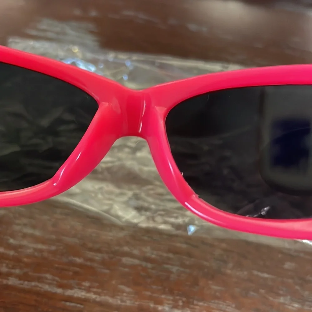 Kids hot pink sunglasses IOP